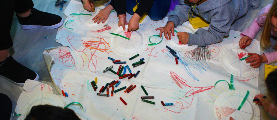 Hands of the students of mandoulides schools kindergarten painting