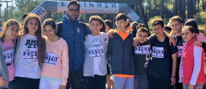 Mr stefanidis with 4 girls and 5 boys, students of mantoulides schools that took part in the event